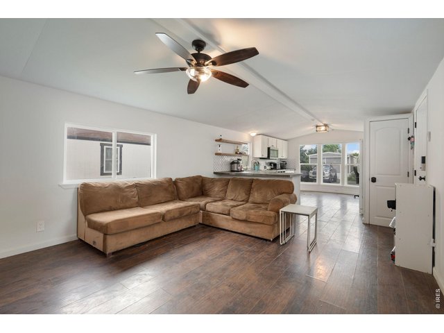 Property Photo 5 Beautiful laminate flooring throughout.