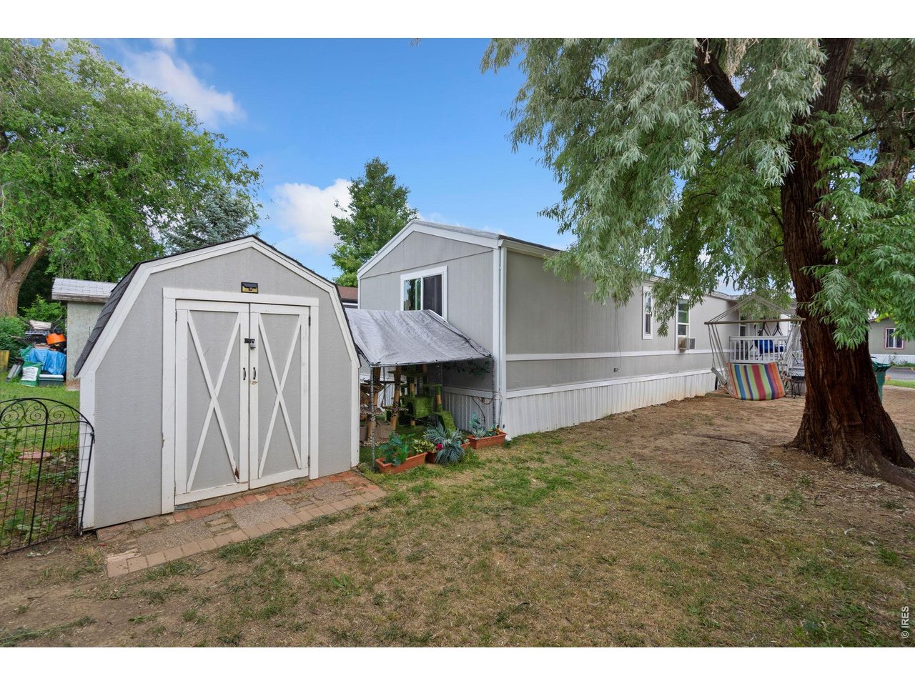 Shed perfect for extra storage. Catio to be removed.