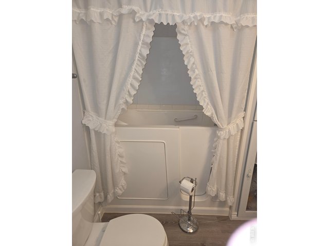 Property Photo 23 Master Bath Tub