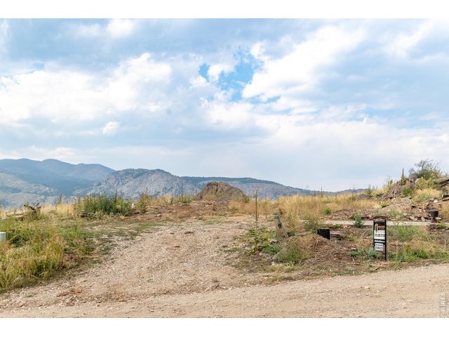 Property Photo 5 Lot has already been leveled for a home and parking area, since there was a home previously on it. It is ready for your dream home! 