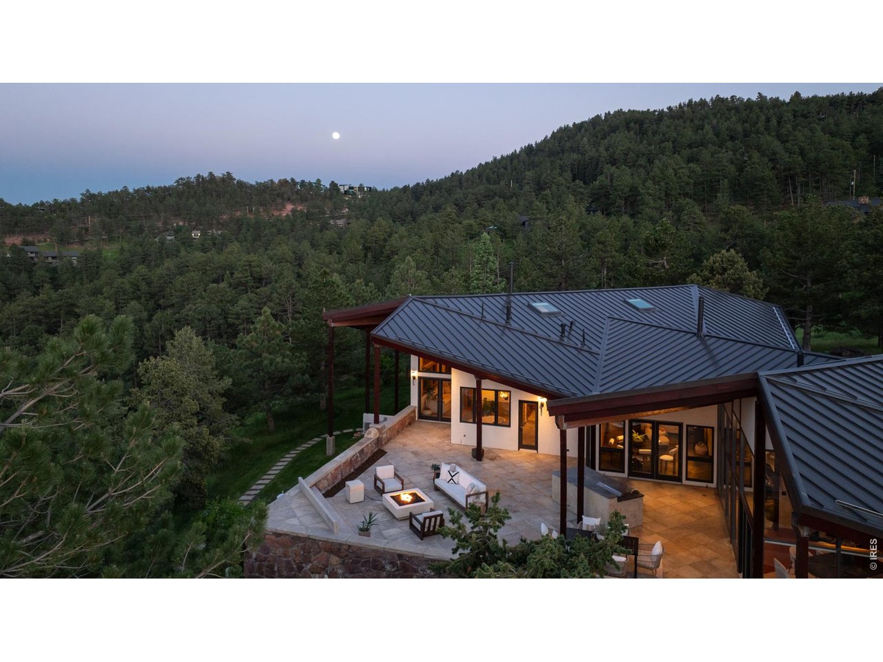 Entertain year round with this fully equipped outdoor kitchen and living space. 