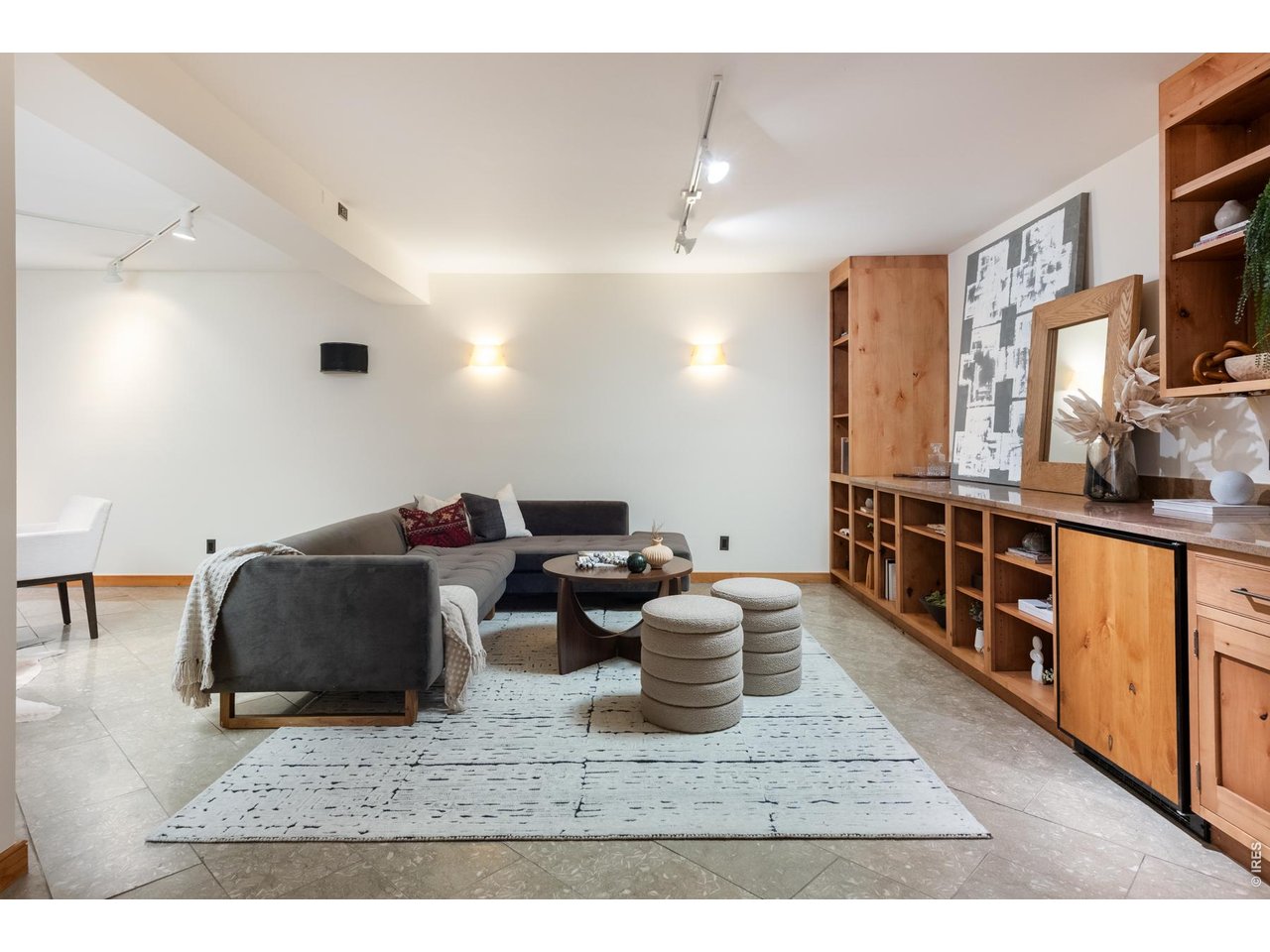 Lower level media room with lower level bedroom, walkout office space, full bath and additional laundry room.