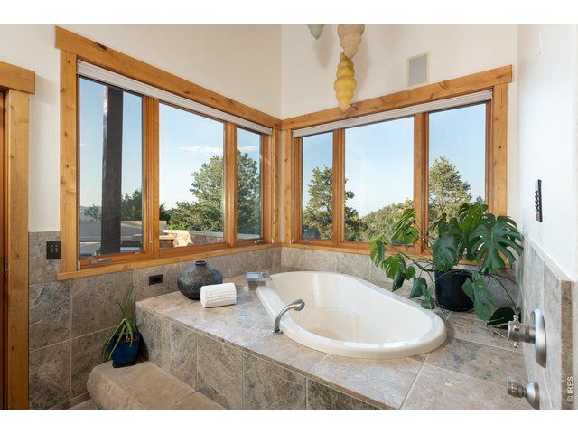 Property Photo 23 Oversized primary suite soaking tubs with endless views. 