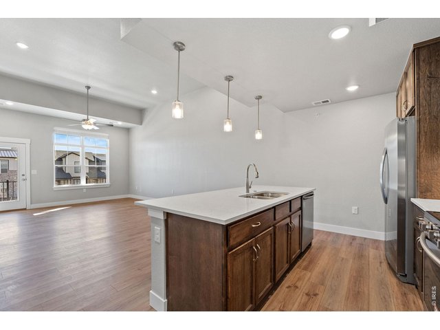 Property Photo 2 Open, bright kitchen with timeless finishes