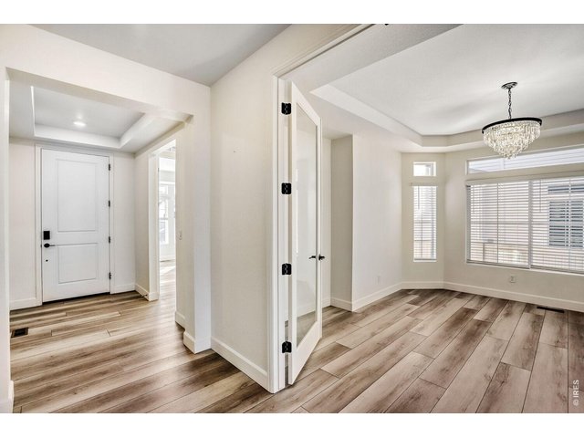 Property Photo 11 Wide Entryway and Separate Formal Dining Room
