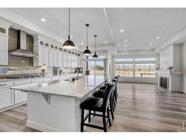 Property Photo 2 Chef's Kitchen with Stunning Quartz Countertops 