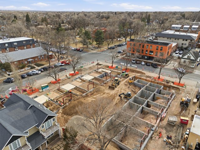 Property Photo 12 South Side Aerial - faces award winning L'Avenir!