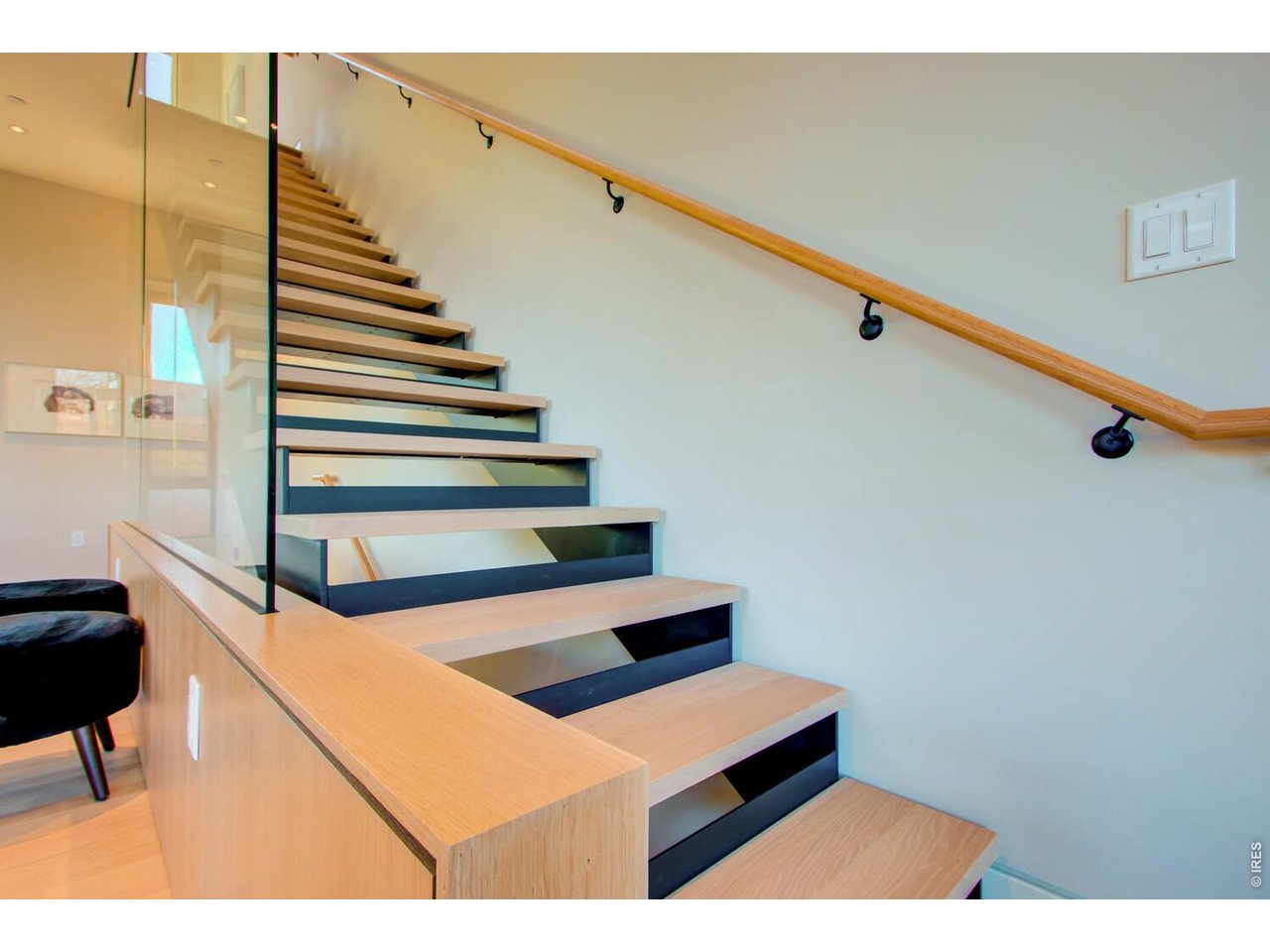 Stunning Floating staircase from Living Level to Sleeping Level. *Similar floor plan, finishes and feel at L'Avenir! (Picture is not of the actual build)