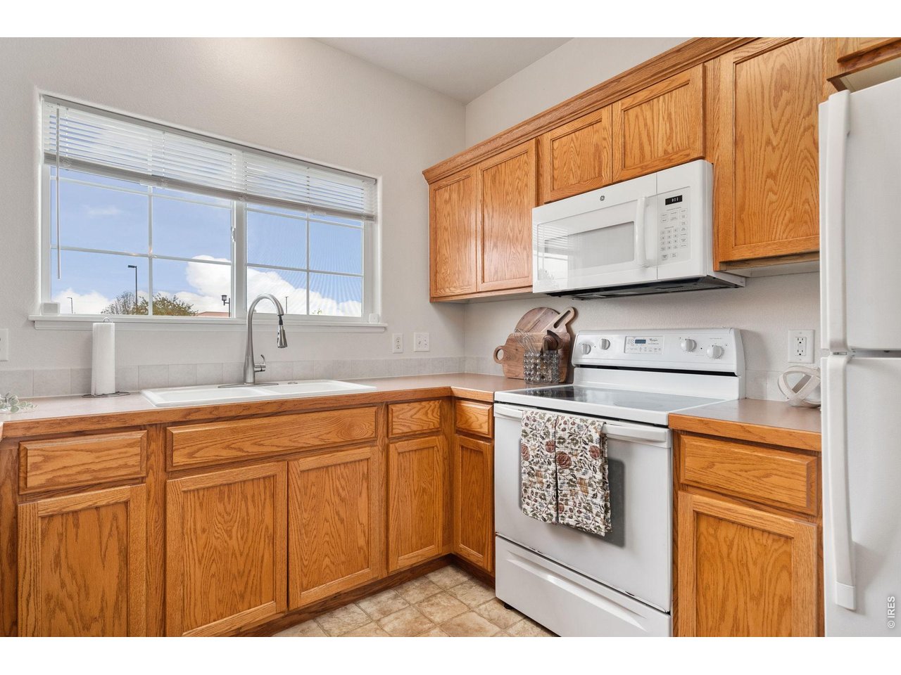 Functional kitchen that is clean, bright, and ready for your favorite meals.