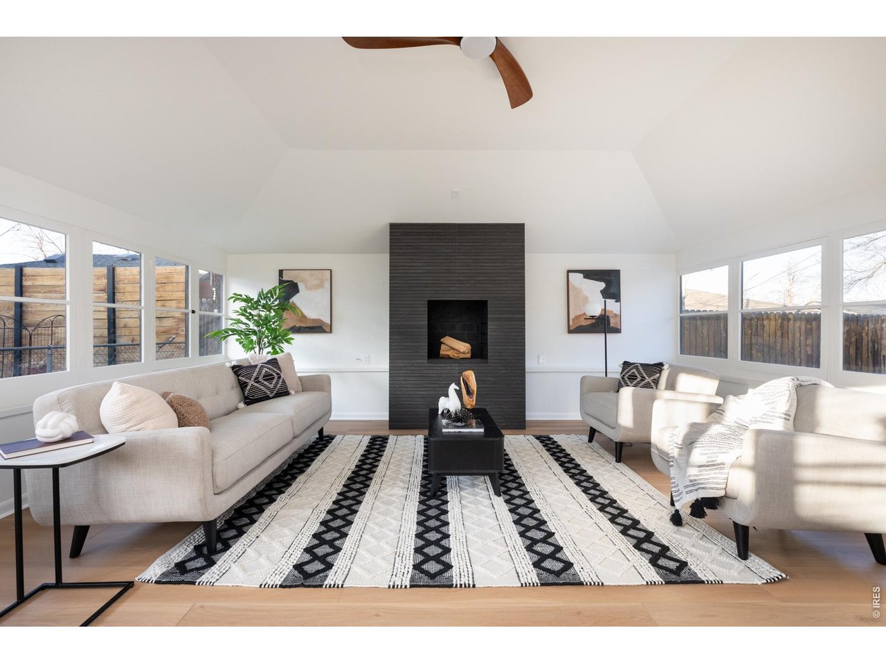 Cozy living room with access to backyard patio outdoor living. 