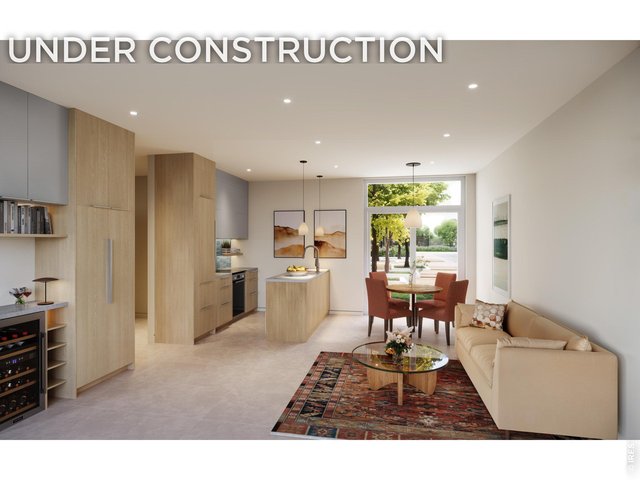 Property Photo 1 La Vie Lumiere *Interior rendering of the main living level. Corner Residence - 2 Story Townhome facing south, airy open concept. Entertainer's kitchen, huge 5 X 19 patio off the SW side, abundant outdoor living space! 
