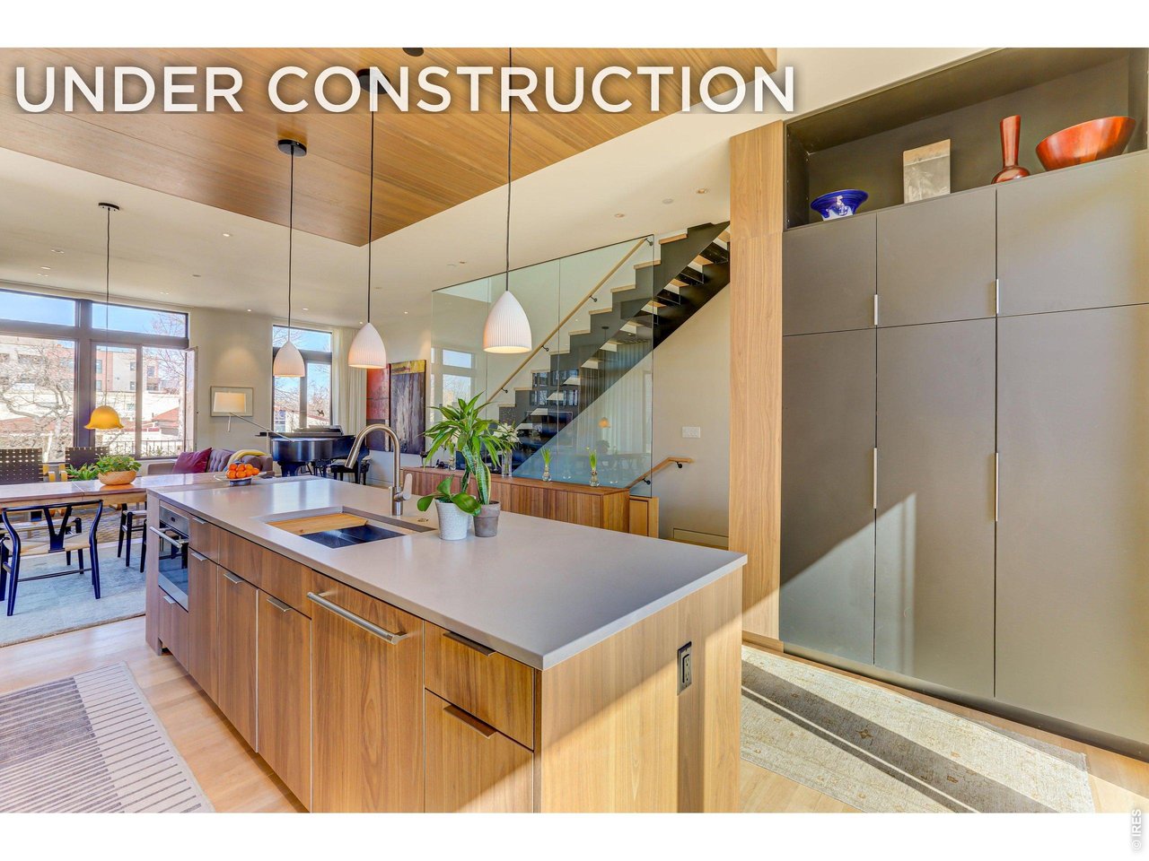 Another angle in the kitchen Concept Main Living Level! *Similar floor plan, finishes and feel at L'Avenir! (Picture is not of the actual build) Quartz Countertops, Shinnoki cabinetry. 