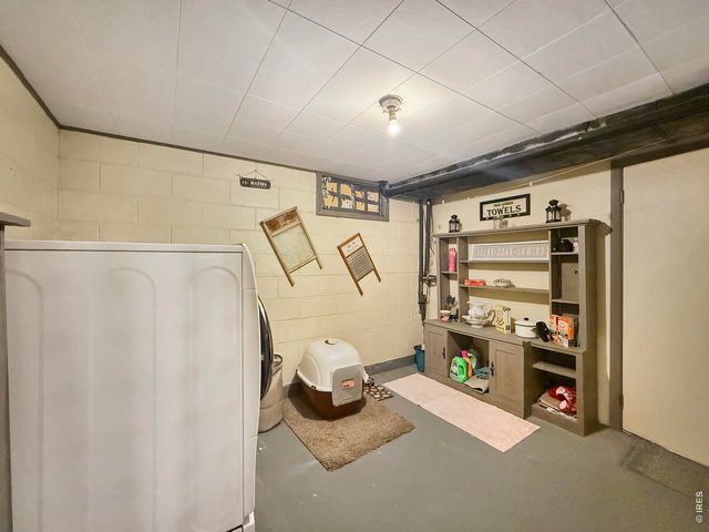 Property Photo 27 Laundry Room in Basement