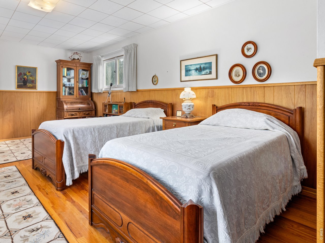 Large Bedroom with Wood Floors
