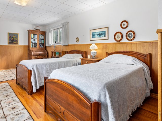 Property Photo 7 Large Bedroom with Wood Floors