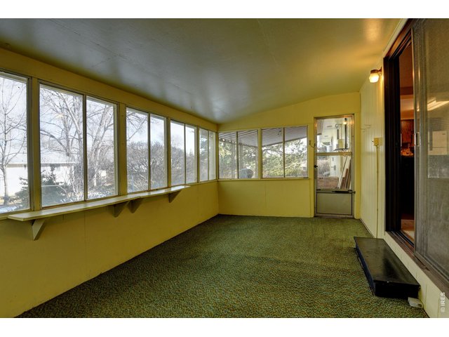 Property Photo 28 Enclosed sunroom