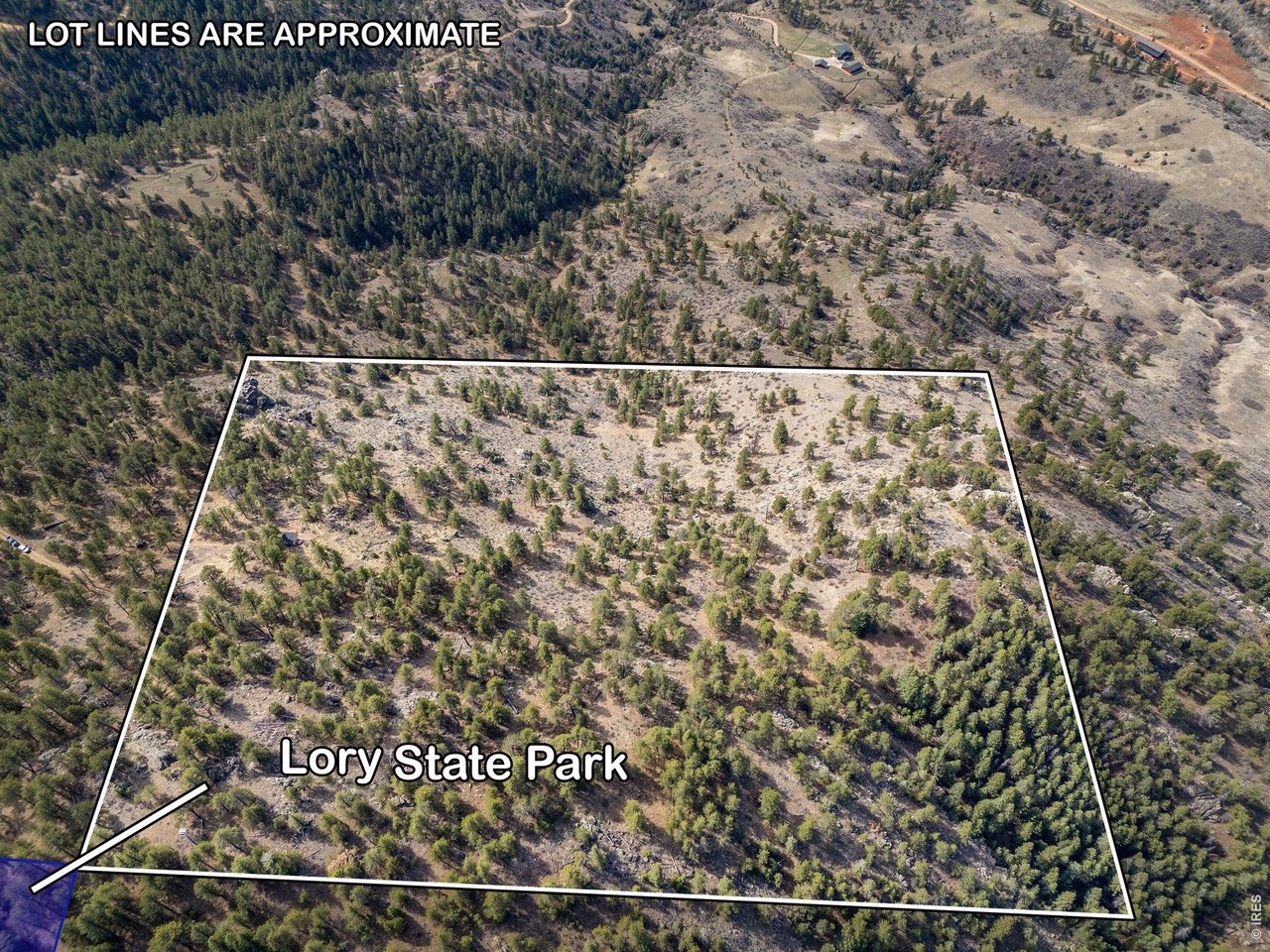 Lory State Park borders on the corner of the property. Lot lines are approximate and are for reference only.