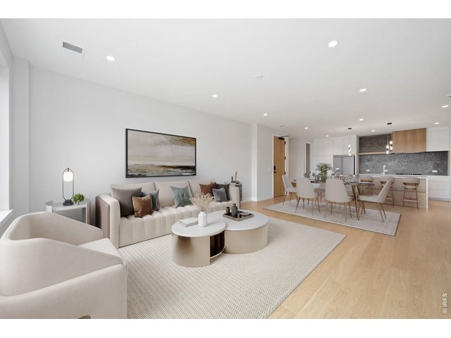 Property Photo 1 Living room looking into dining area