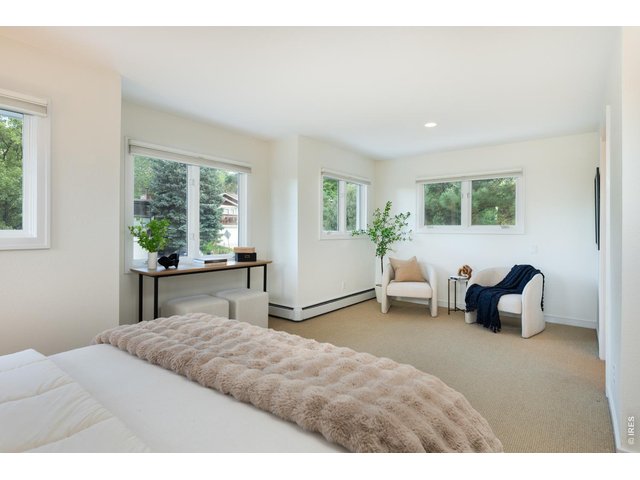 Property Photo 26 Explore the full-floor owner's retreat featuring a king-size bedroom with 270-degree treetop views. 