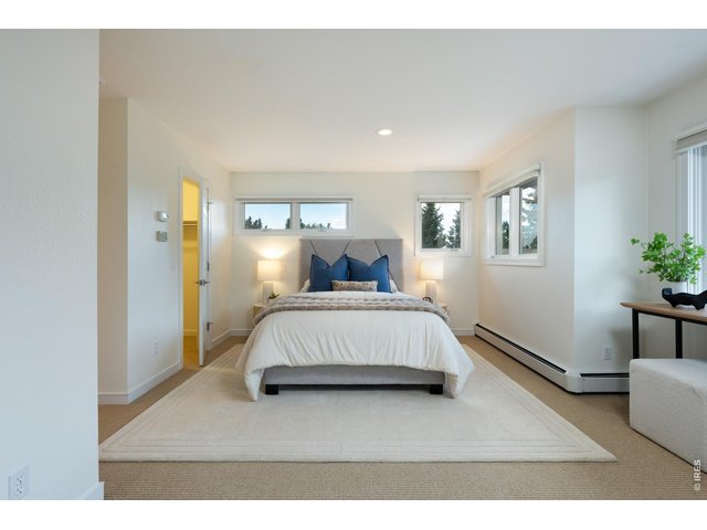 Property Photo 25 The primary suite is an absolute retreat! Including a spacious walk-in closet, reading area and ensuite primary bath