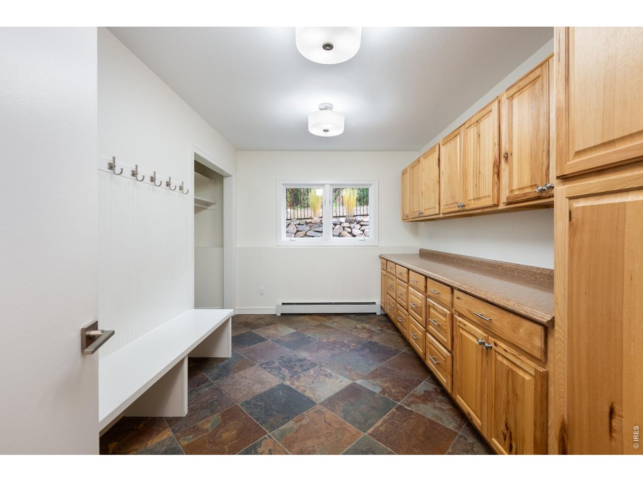 Spacious mudroom/flex space. 