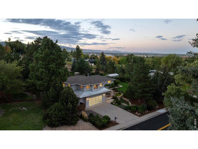 Property Photo 43 A manicured front yard adds wonderful curb appeal to this immaculate South Boulder sanctuary. 