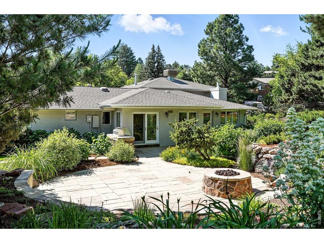 Property Photo 38 Beautifully landscaped patio and firepit.