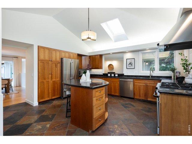 Property Photo 16 Abundant custom cabinetry makes for easy organization and storage.