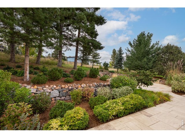 Property Photo 8 Pristine landscaping creates unmatched privacy and serenity.