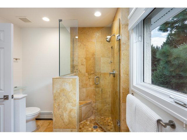 Property Photo 31 Walk-in shower with custom bench
