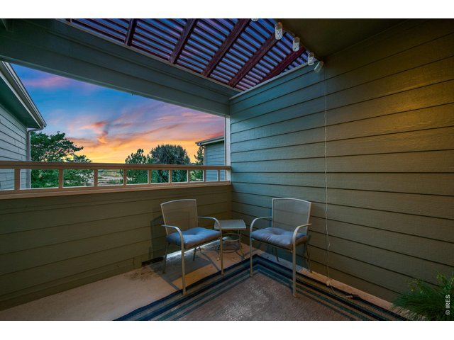 Property Photo 2 Balcony perfect for quiet evenings and sunset views.
