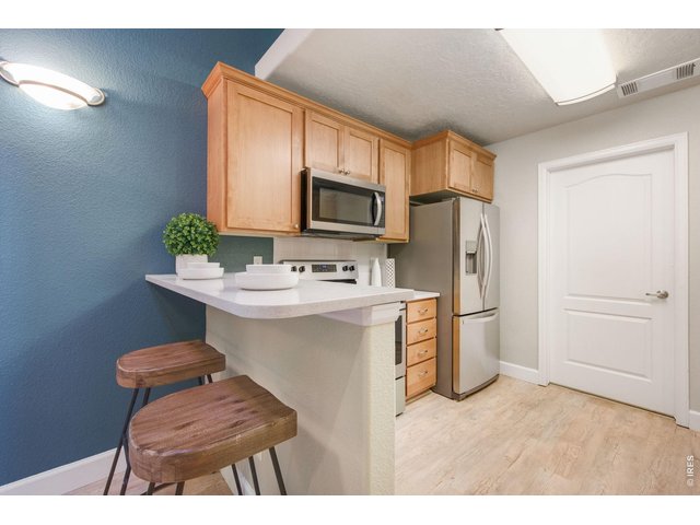 Property Photo 4 Spacious kitchen with quartz countertops