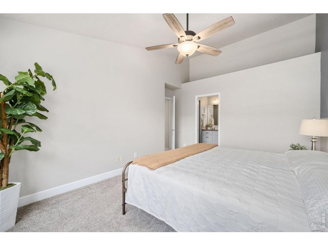 Property Photo 12 Peaceful primary suite designed for comfort. Includes walk-in closet. 