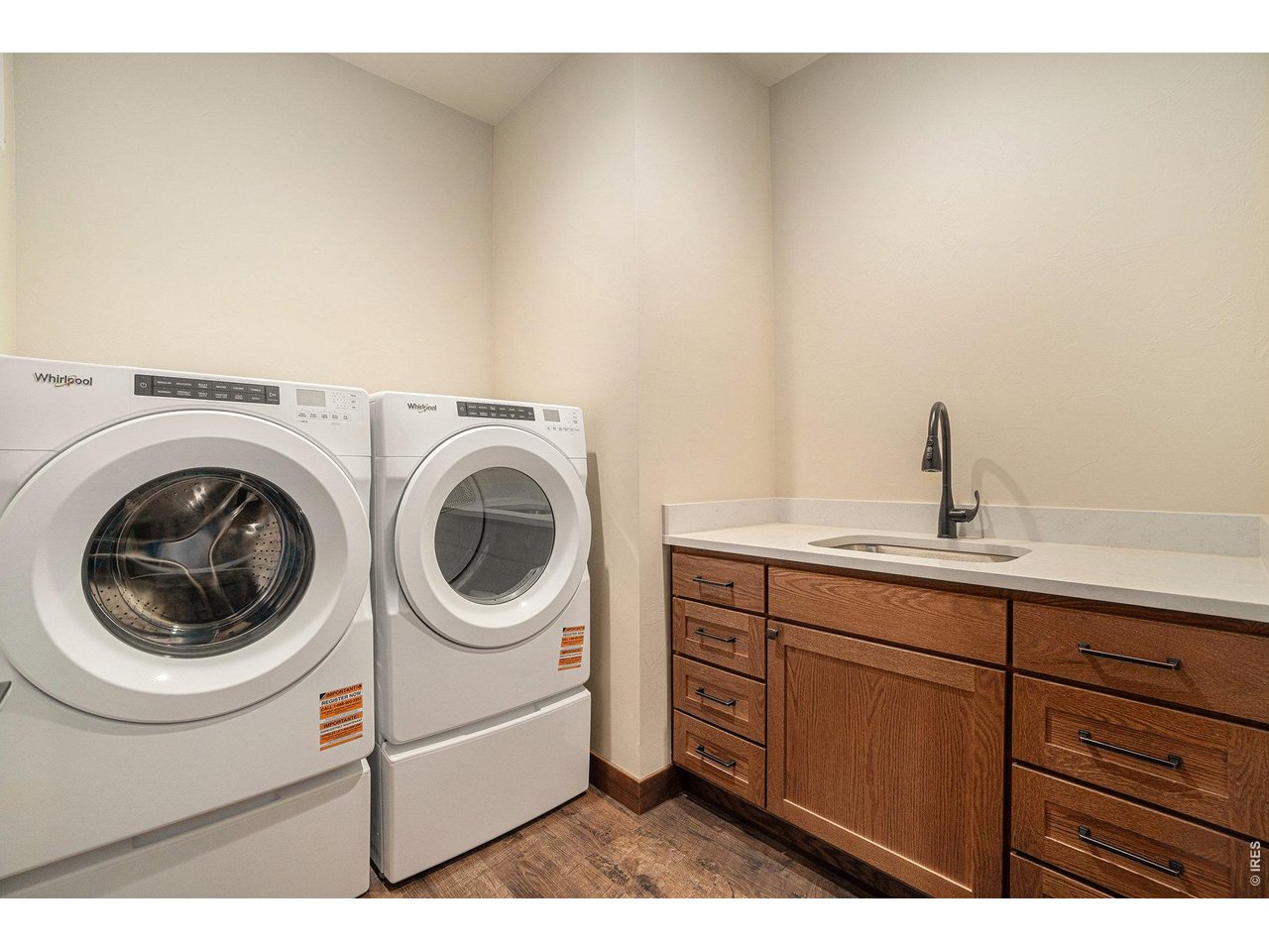 Laundry room with counter and sink. All appliances included
