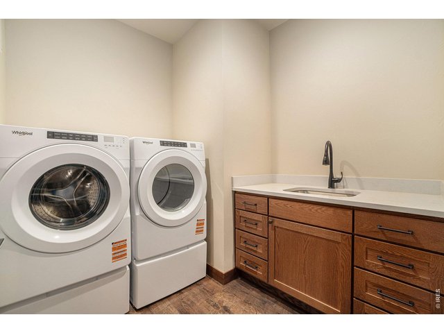 Property Photo 19 Laundry room with counter and sink. All appliances included