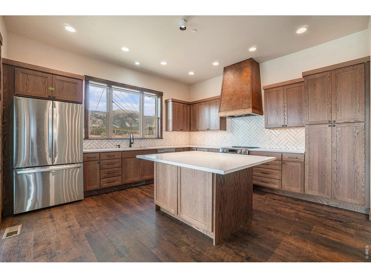 Large kitchen island and quartz countertops