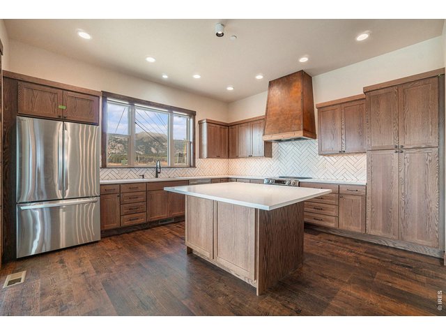 Property Photo 9 Large kitchen island and quartz countertops