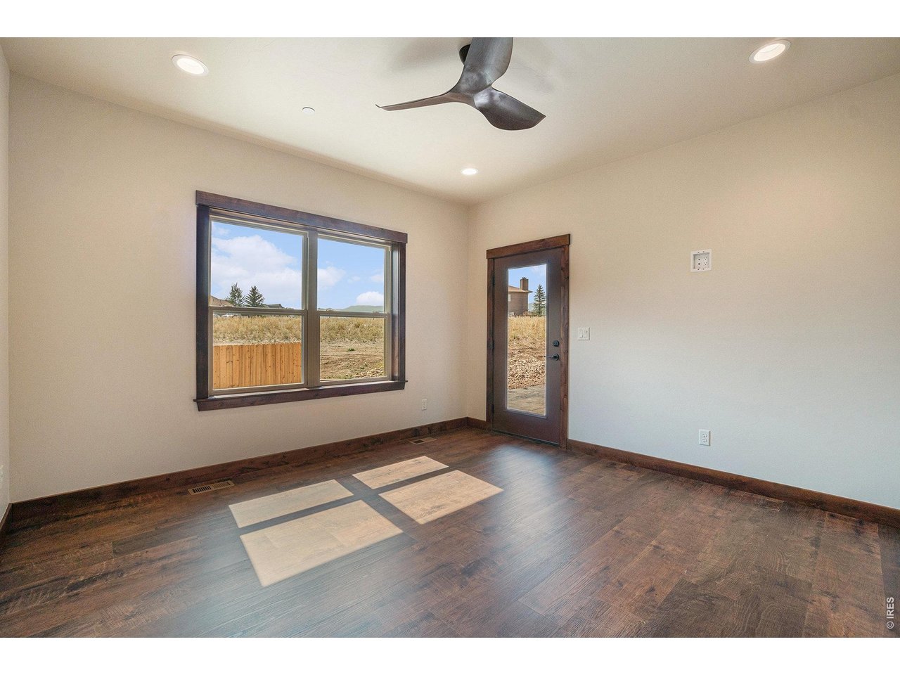 Primary bedroom with patio access