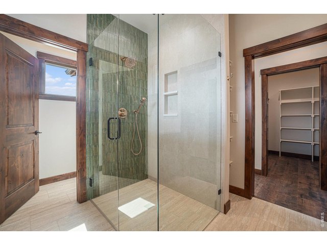 Property Photo 15 Zero- entry glass shower