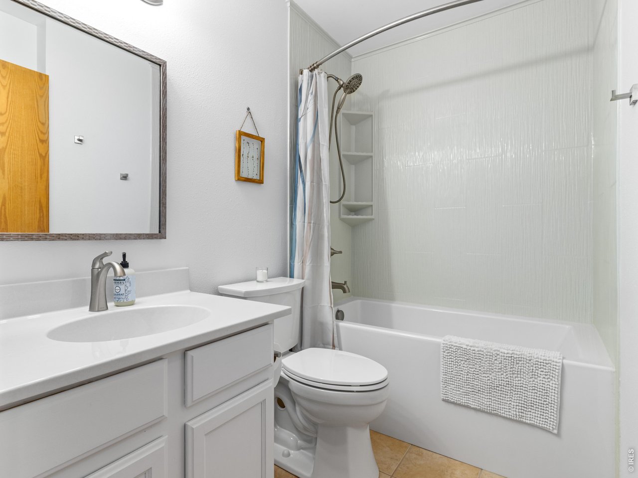 Beautifully remodeled bathroom includes new soaking tub.