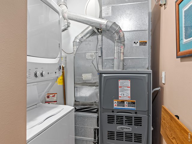 Property Photo 23 Easy access furnace room includes new washer/dryer.