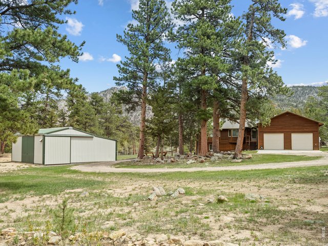 Property Photo 5 Main house and barn/RV storage/shop/hay storage