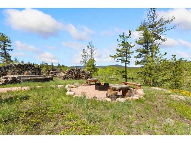 Property Photo 9 Benches and plenty of firewood!