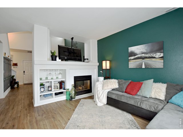 Property Photo 12 Family room with fireplace