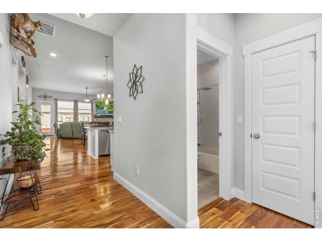 Property Photo 7 Acacia Wood Flooring throughout the main level