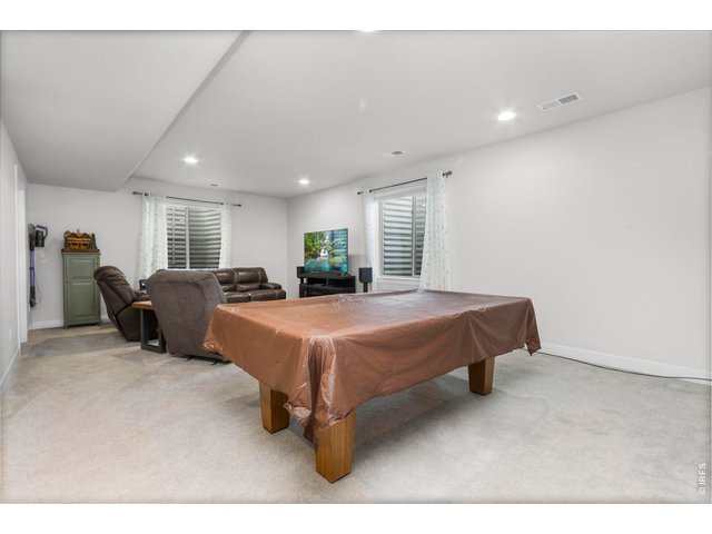 Property Photo 30 Large rec room in basement with pool table included