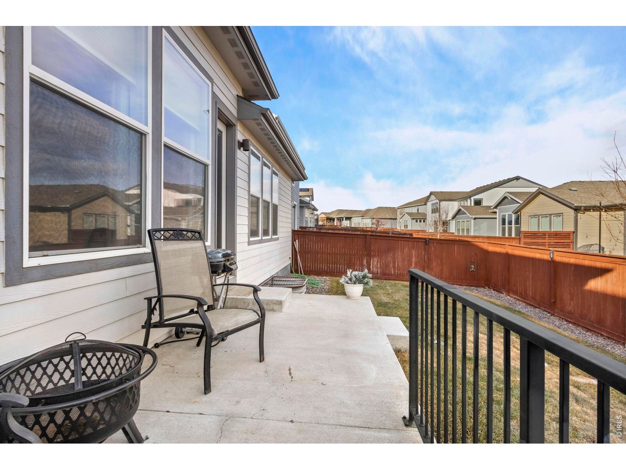 The backyard is a perfect space for relaxing or having a BBQ