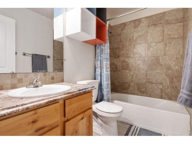 Property Photo 21 Bathroom- Upstairs