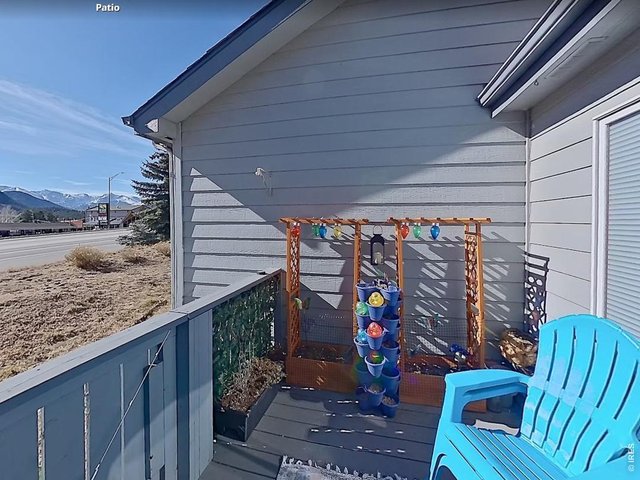 Property Photo 22 Relax on the deck and enjoy that fresh mountain air and the snow capped mountain views.