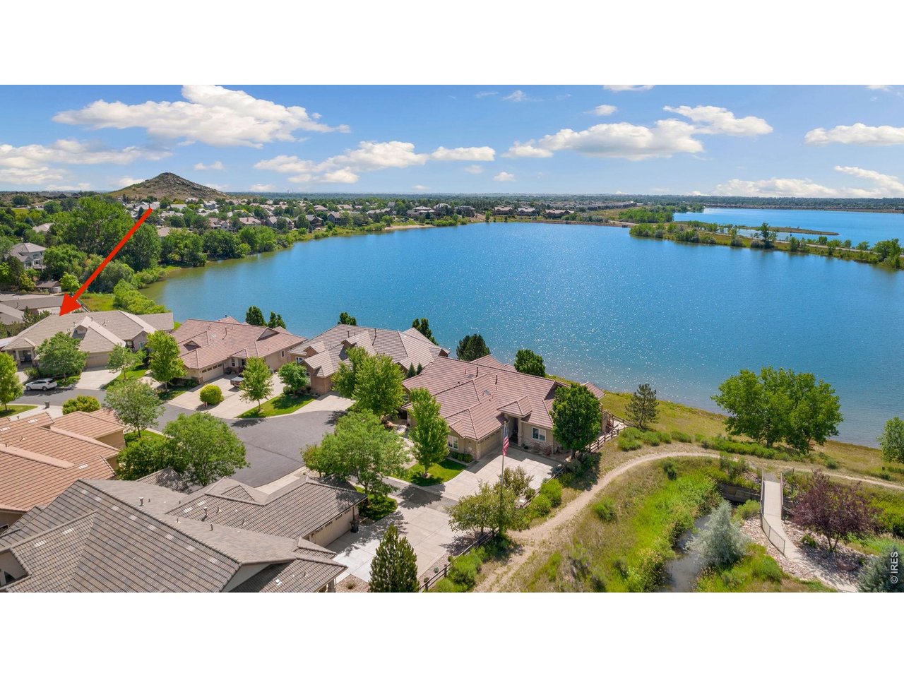 Nice summer shot of this patio home in the Mariana Butte Golf Course.